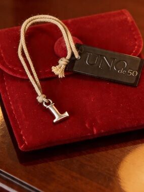 “L” Charm in Sterling Silver-Plated by UNO de 50
